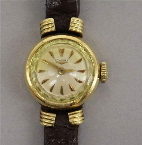 A Longines ladys 18ct gold wrist watch